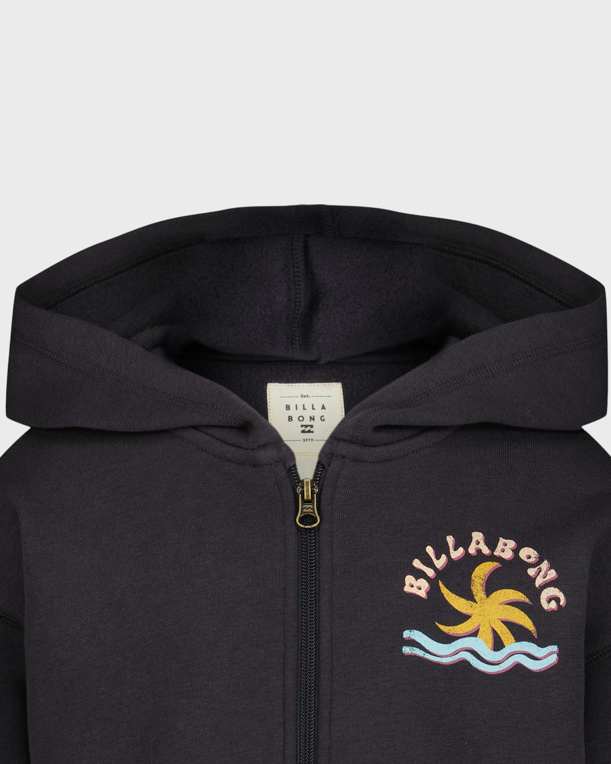 Black hoodie with Billabong logo and design on a light gray background