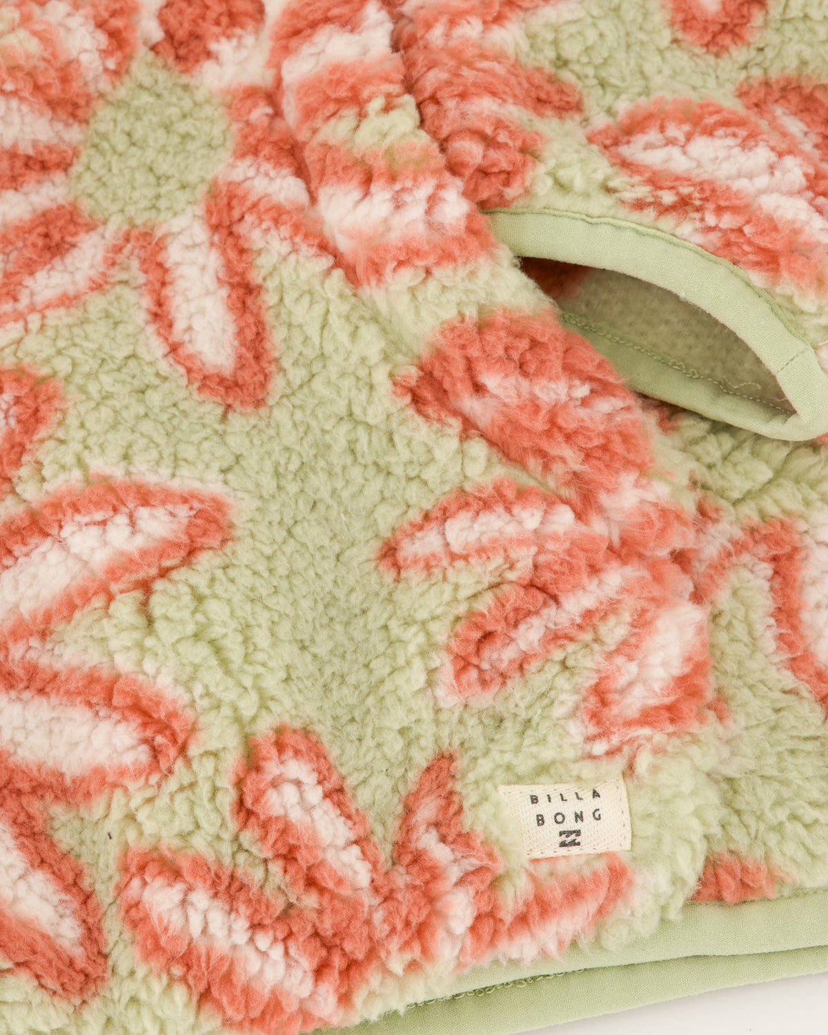 Floral patterned blanket with 'Billa Bong' label on a white background