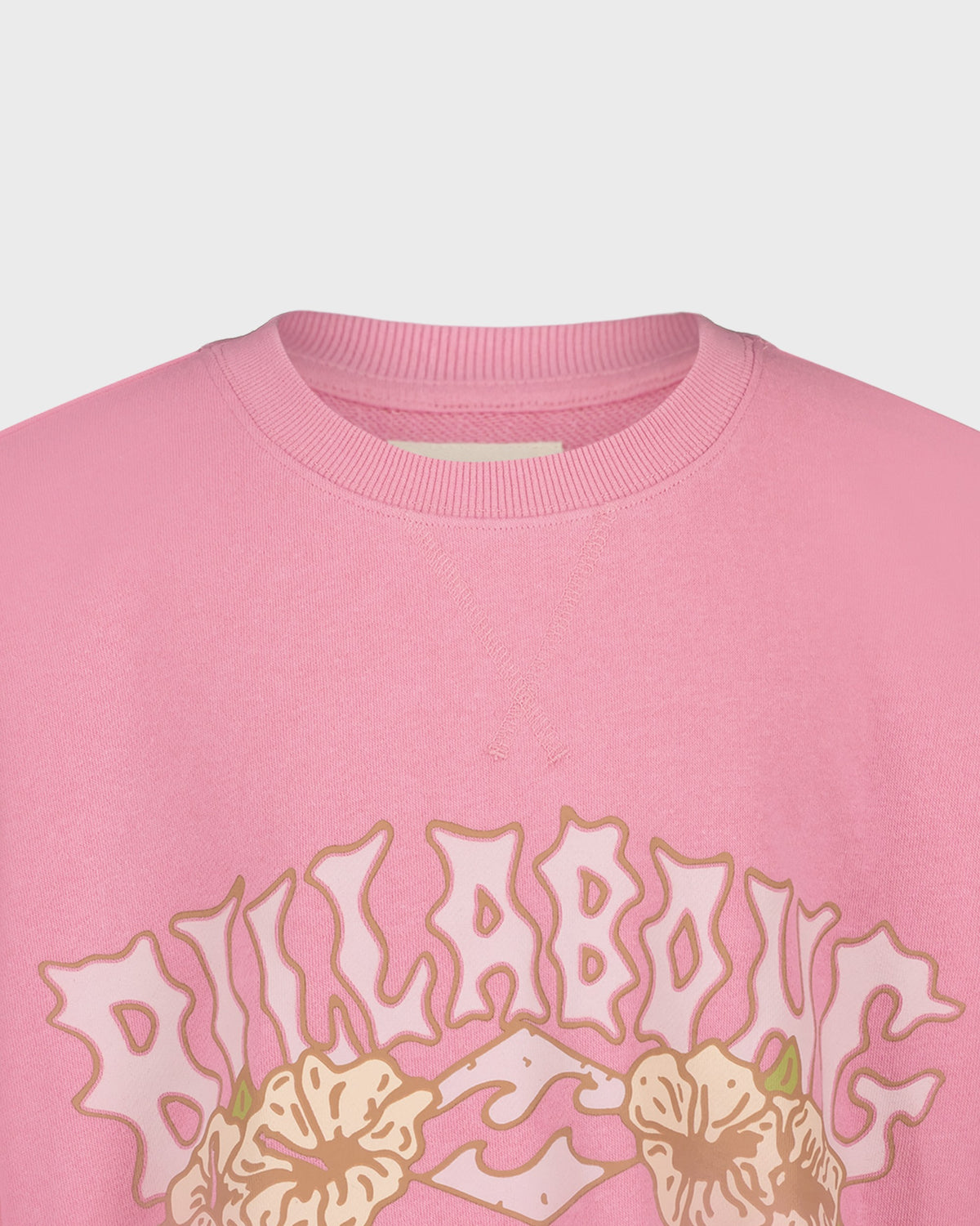 Pink sweatshirt with 'Billabong' logo and floral designs on a light gray background