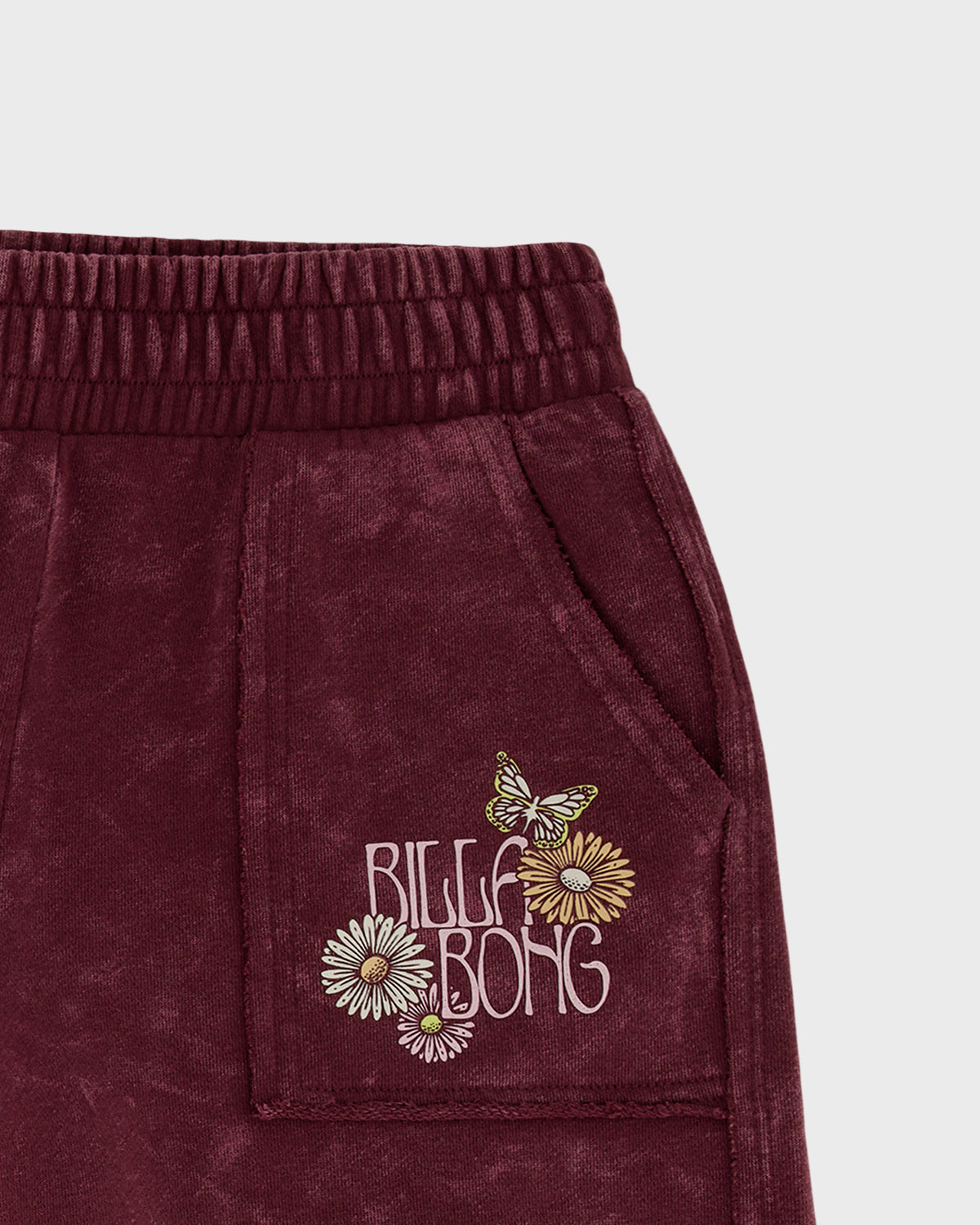 Burgundy wide leg pant with elastic waistband and embroidered wildflower and butterfly graphic on front pocket.