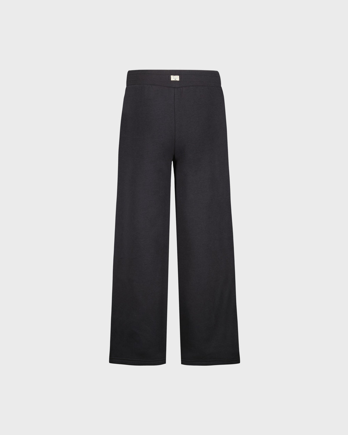 Black pants on a light gray background