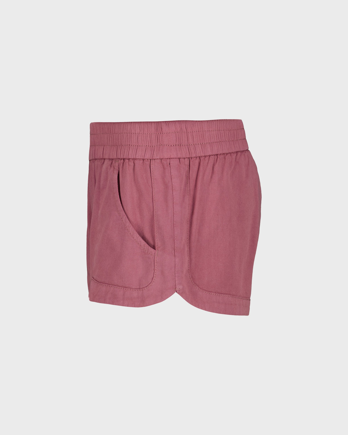 Pink shorts on a light gray background