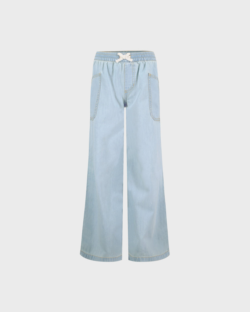 Light blue denim pants on a white background