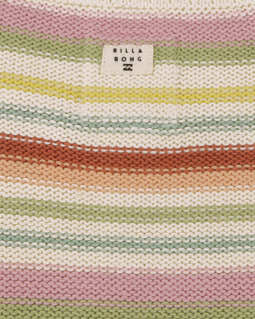 Striped fabric with multicolor pattern and Billabong logo.