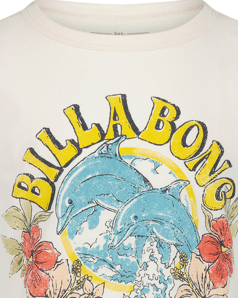 Cream t-shirt with yellow "Balloons" text, two blue dolphins jumping in a circle, and red flowers at the bottom.