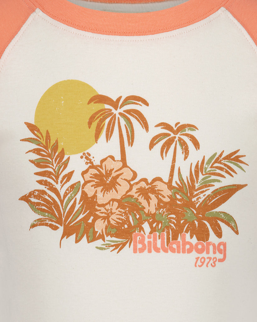 Girls t-shirt with coral ribbed neckline and cream body featuring tropical sunset graphic with palm trees, flowers, and "Bill