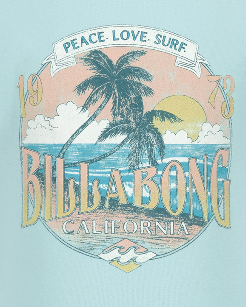 Light blue t-shirt with vintage tropical graphic featuring palm tree, ocean, sun, and "Peace. Love. Surf. Billabong Californi
