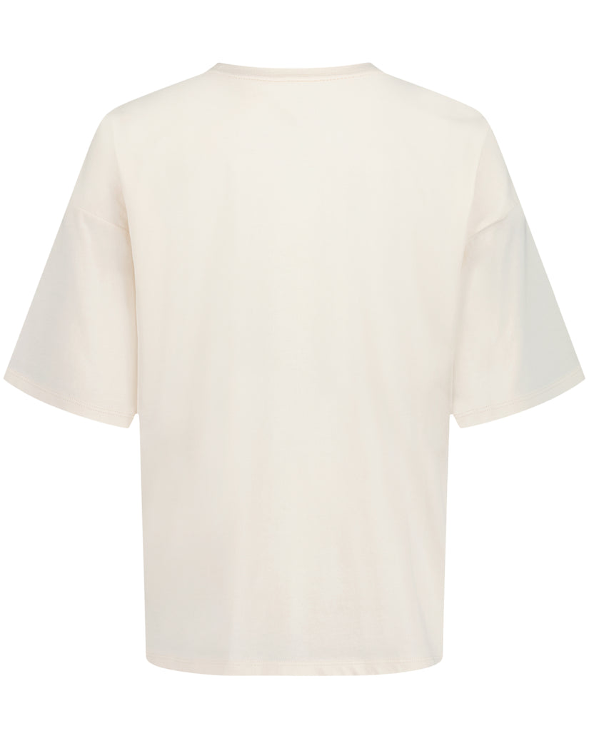 Cream-colored oversized t-shirt with short sleeves and crew neckline, displayed flat against white background.