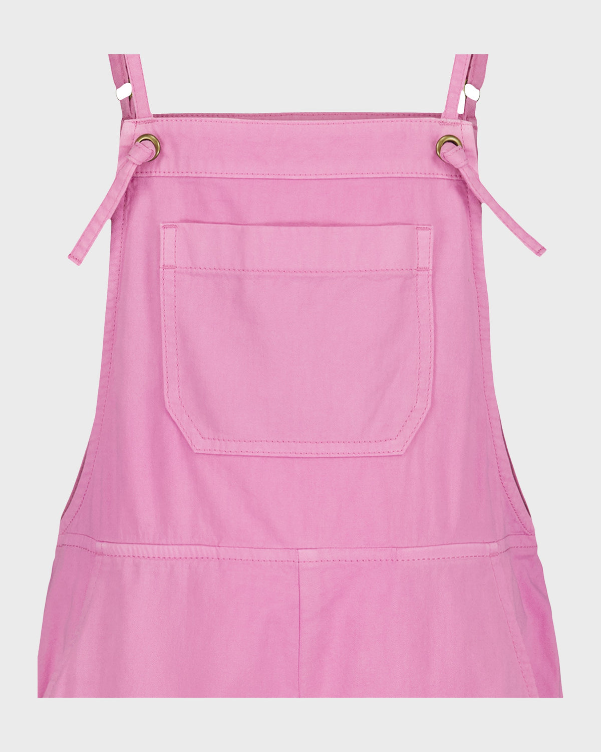 Pink sleeveless romper with adjustable shoulder straps, front pocket, and metal D-ring hardware.