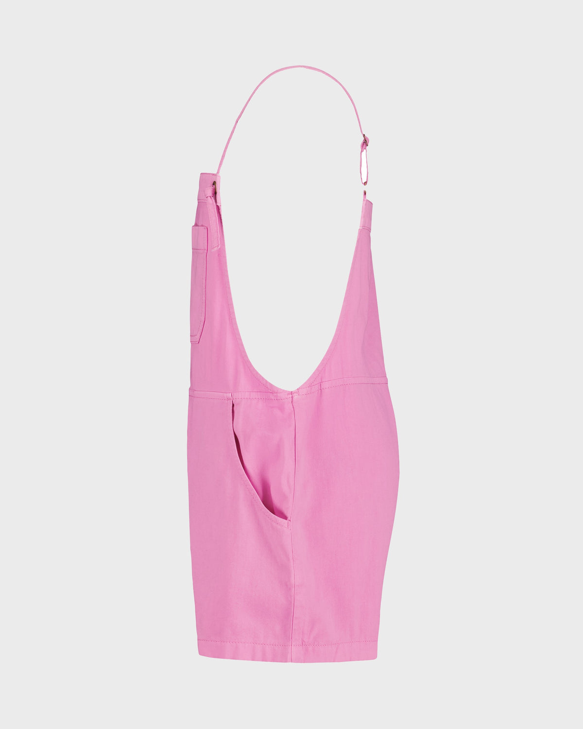 Pink sleeveless romper with deep scoop neckline, side pocket, and adjustable shoulder straps.
