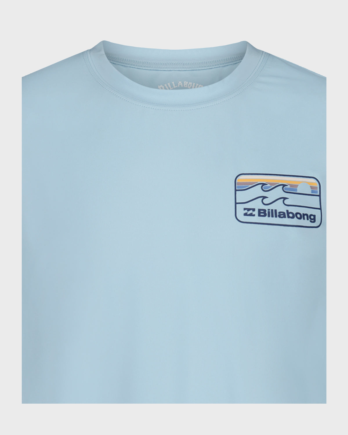 Light blue long sleeve surfshirt with Billabong wave logo patch on chest.