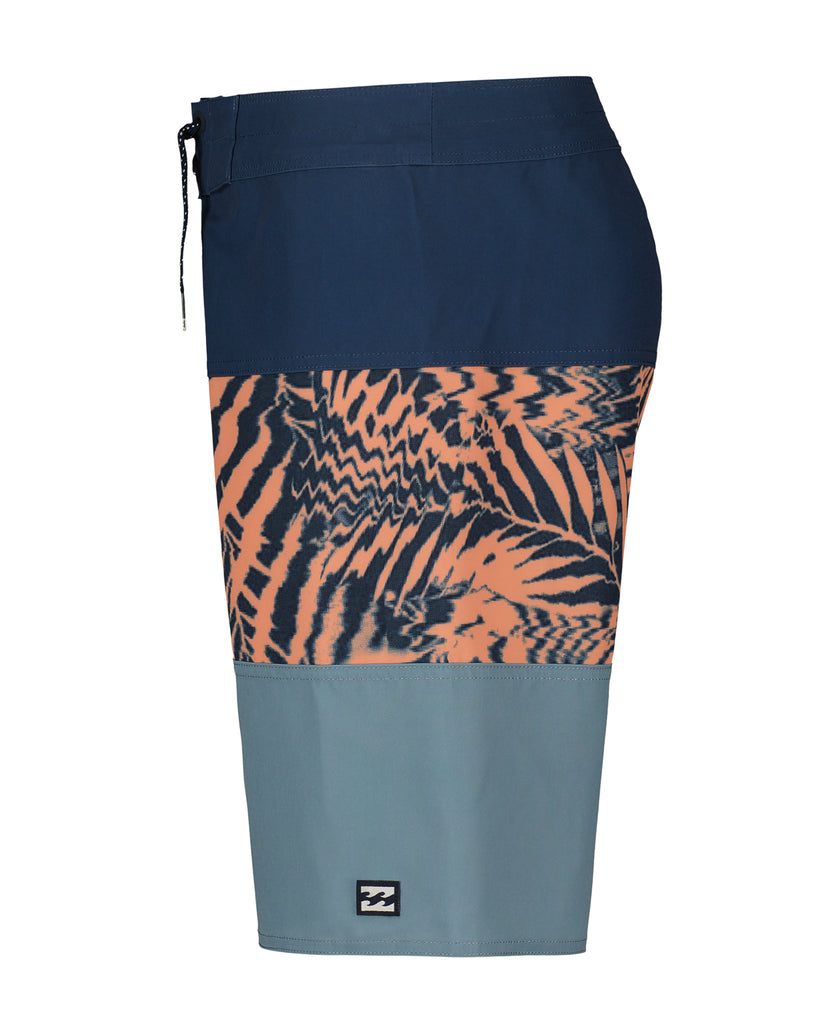 Navy, orange and gray colorblock boardshorts with tropical leaf print and drawstring waistband.