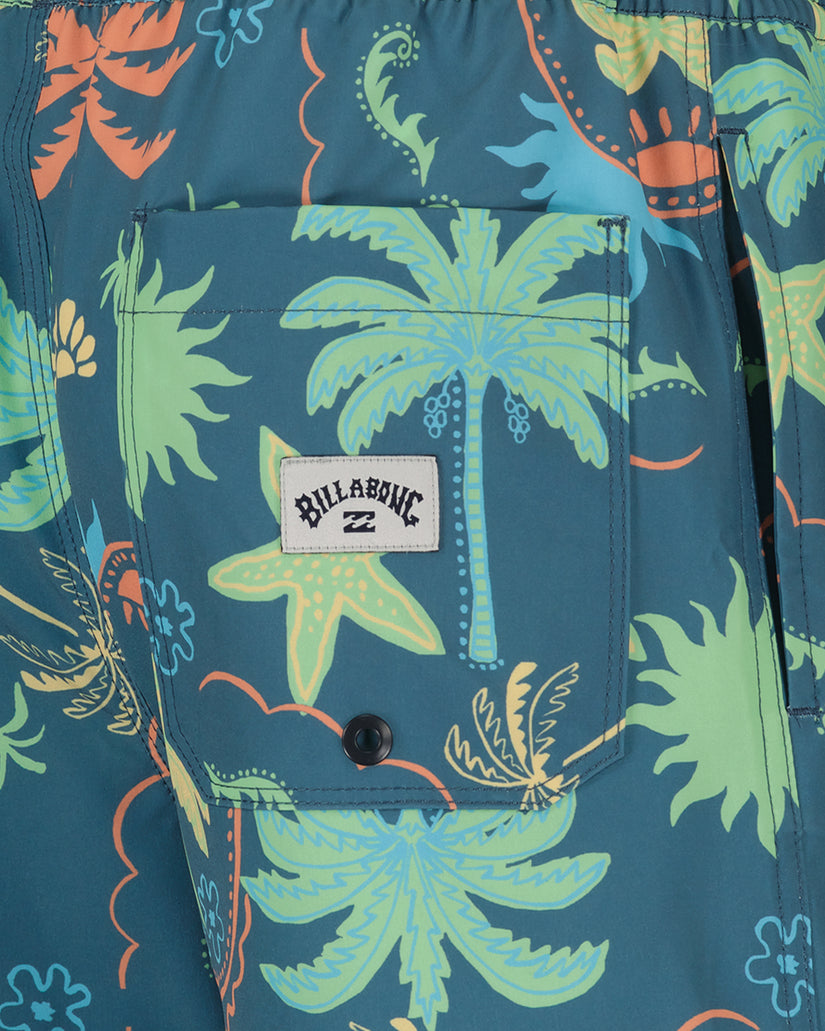 Billabong swim trunks with tropical floral print in teal, lime green, and orange featuring palm trees and decorative flowers.