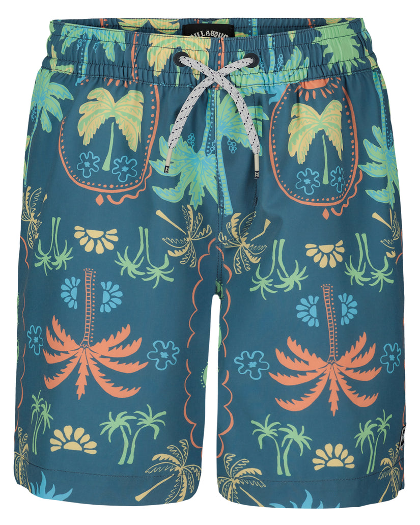 Boys swim trunks with all-over tropical print featuring palm trees, flowers, and suns in yellow, orange, and green on dark te