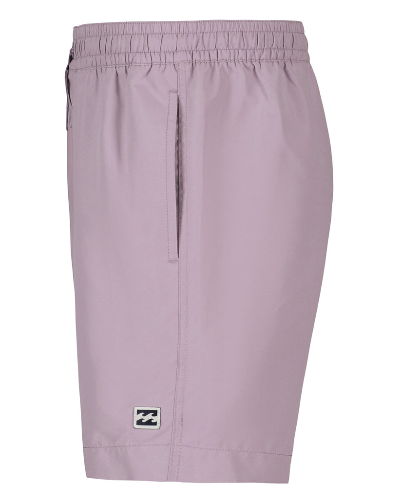 Boys' lavender swim trunks with elastic waistband, center seam, and small brand logo patch on leg.