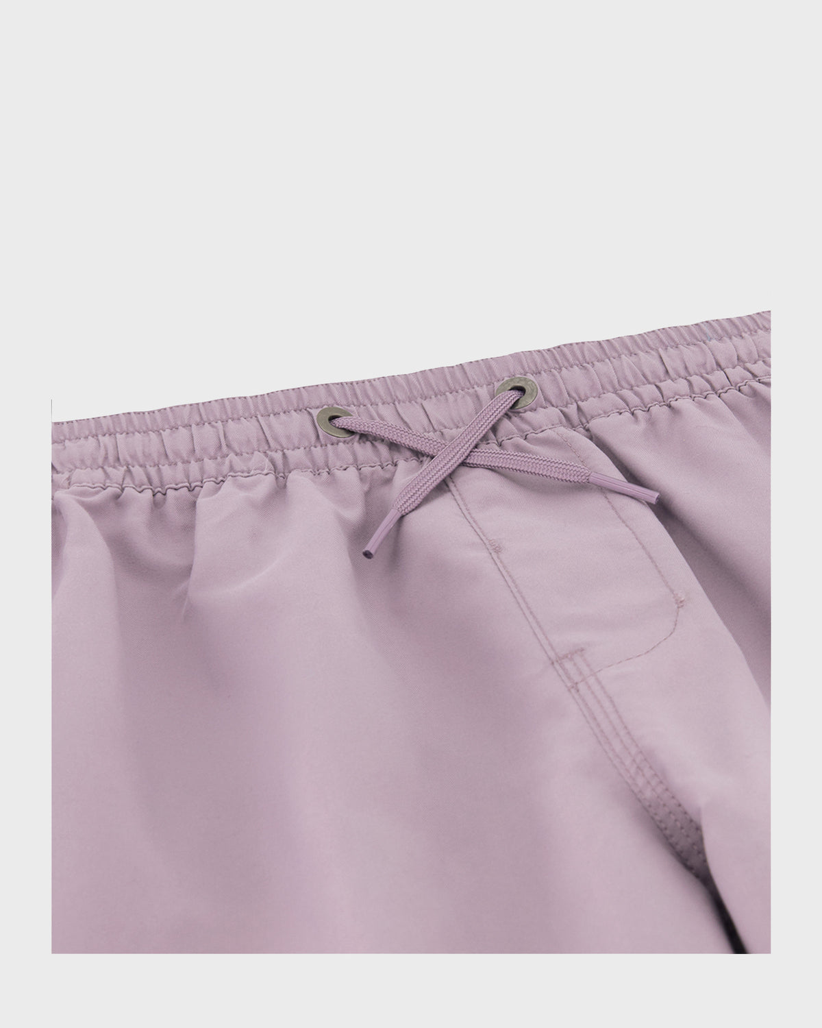 Lavender swim trunks with elasticized waistband, drawstring closure, and front patch pocket.