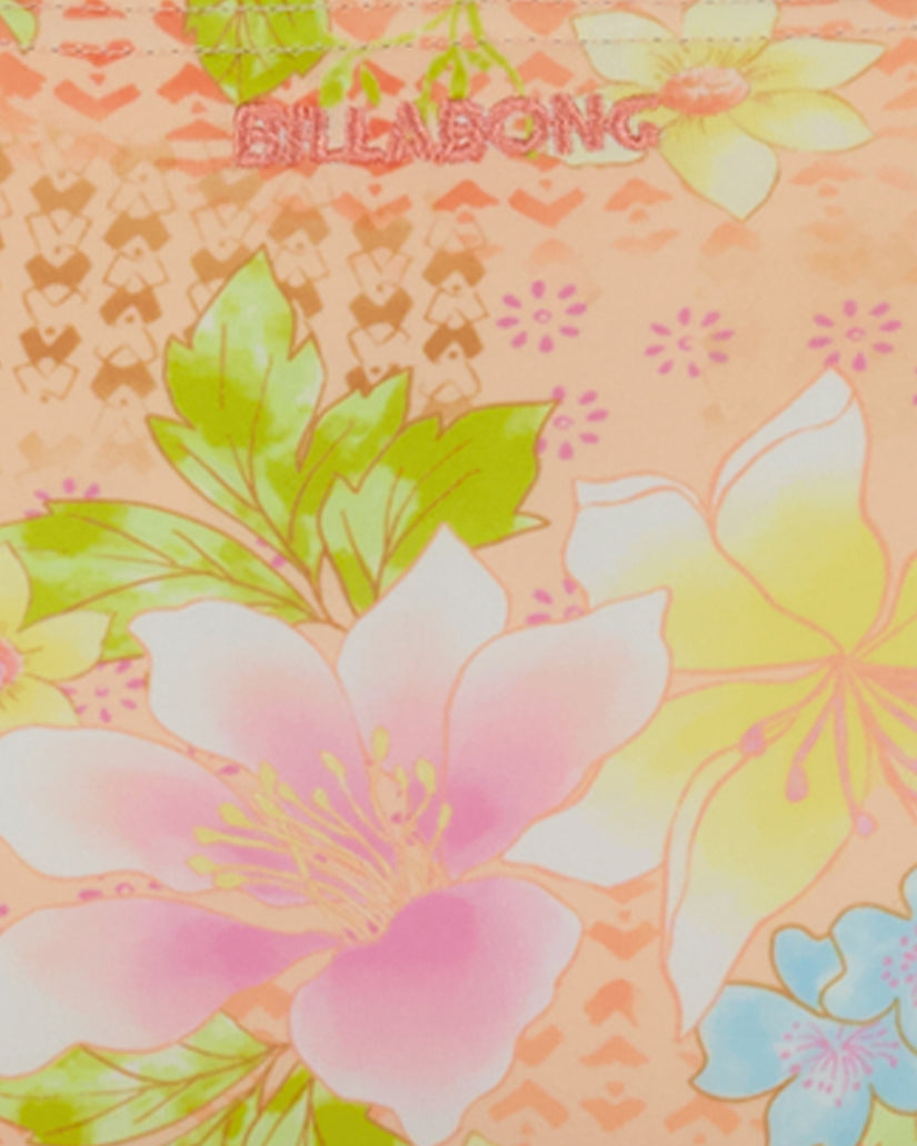 Coral bikini fabric with floral and geometric print design featuring pink flowers, yellow blooms, and green leaves.