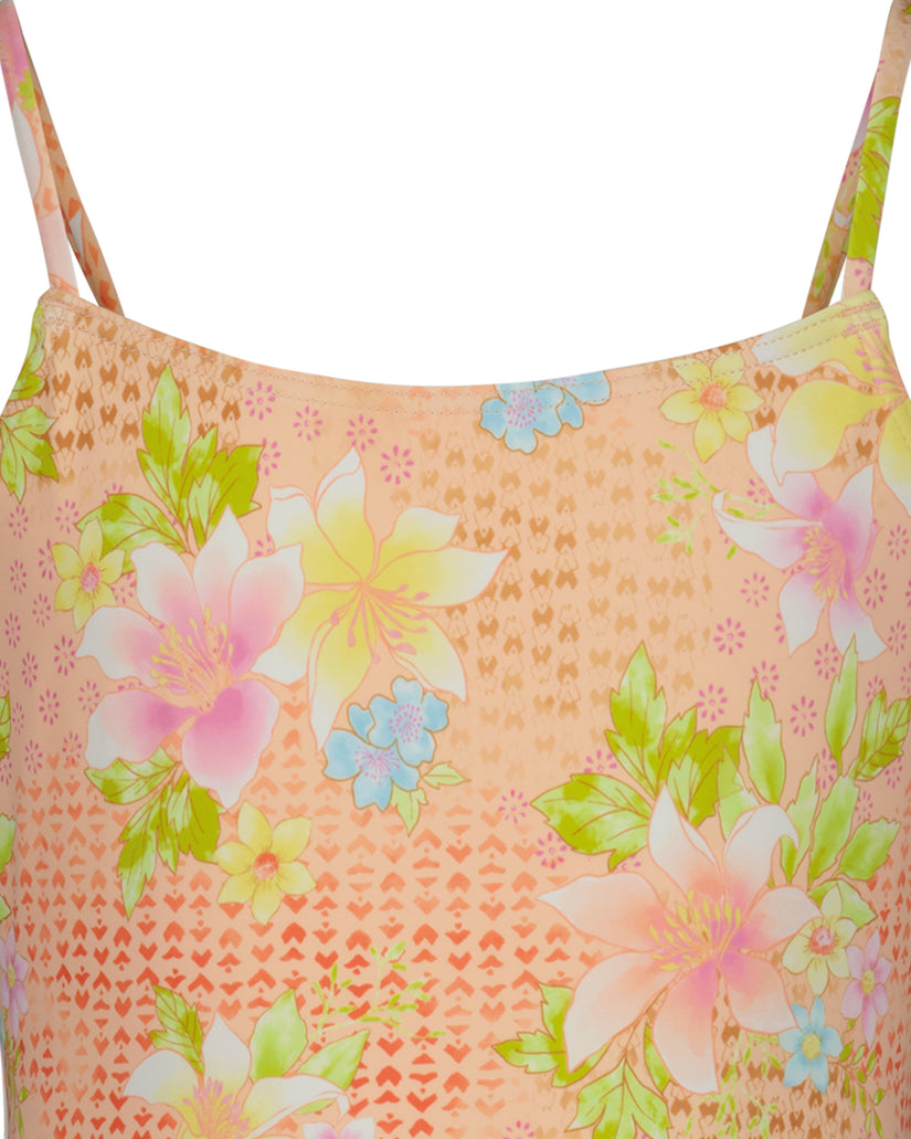 Coral one-piece swimsuit with multicolored floral and geometric pattern, adjustable straps.