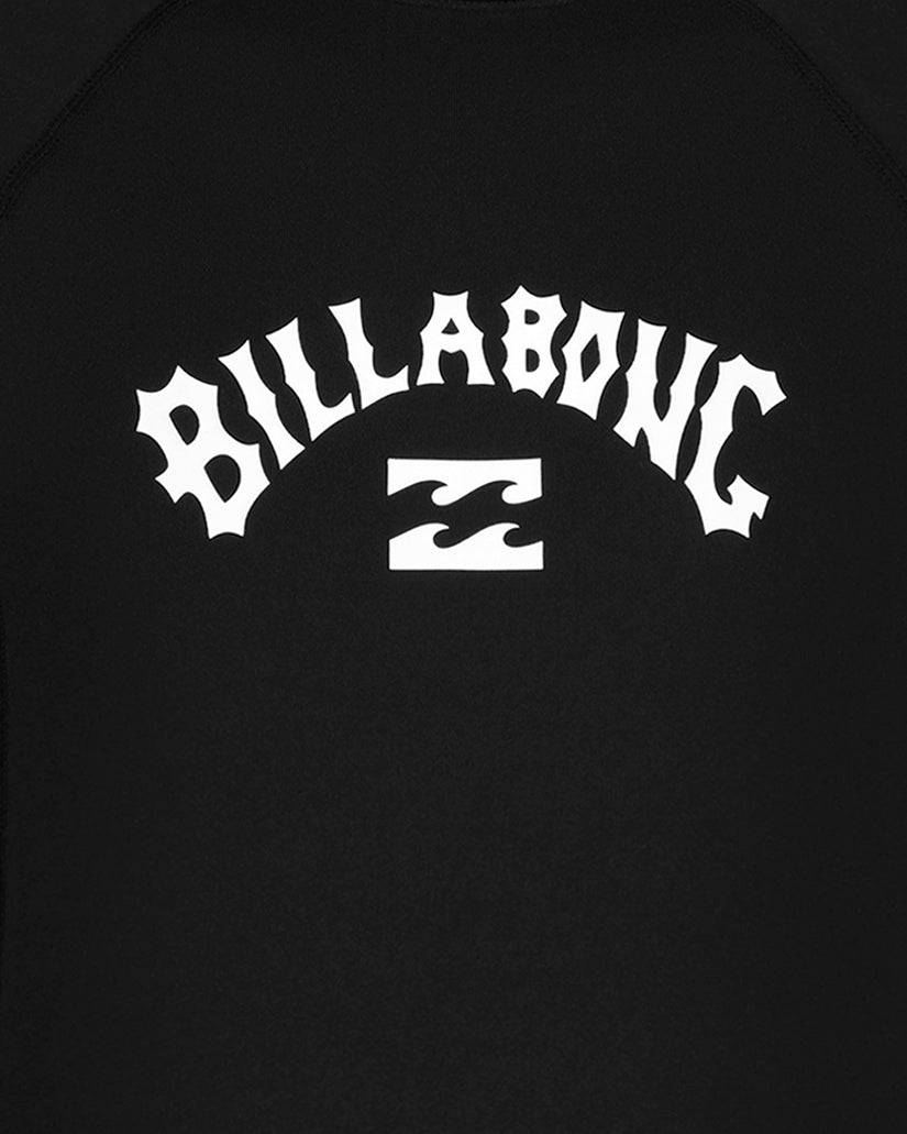 Black long sleeve rashguard with white "Billabong" text and logo on chest.