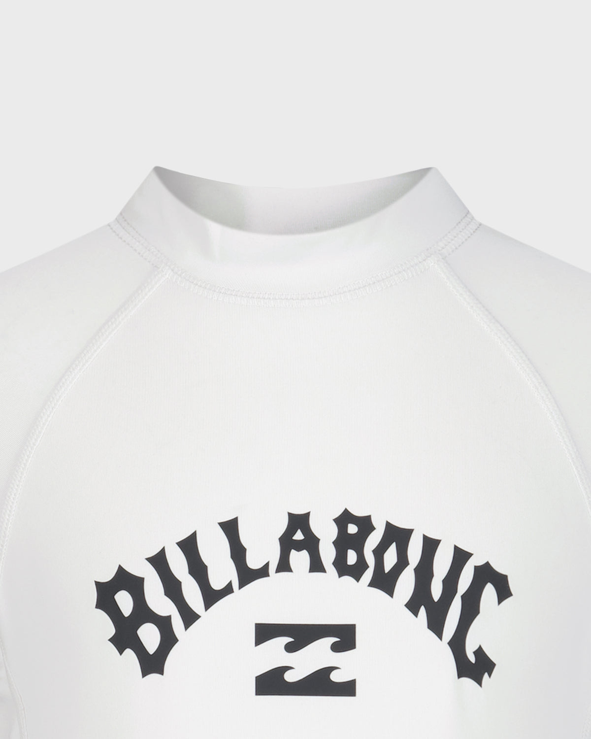 White long sleeve rashguard with black Billabong logo and wave graphic on chest.