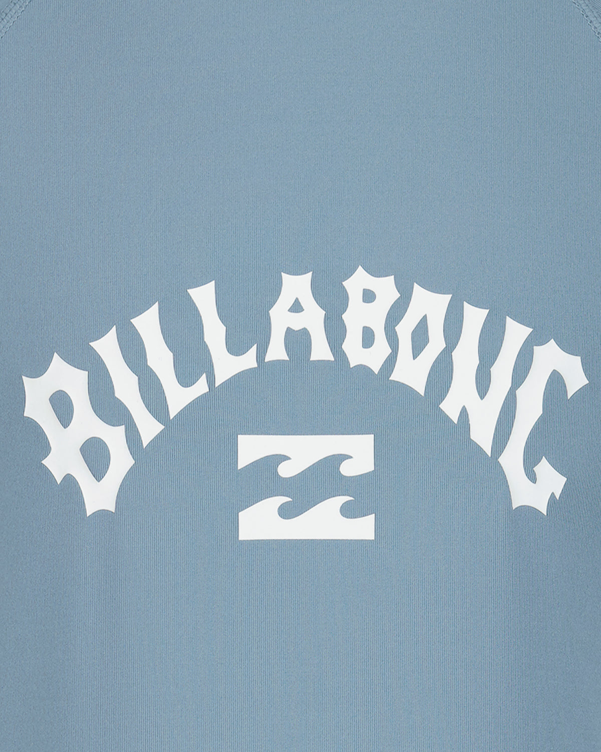 Light blue long sleeve rashguard with white "Billabong" text and wave logo on chest.