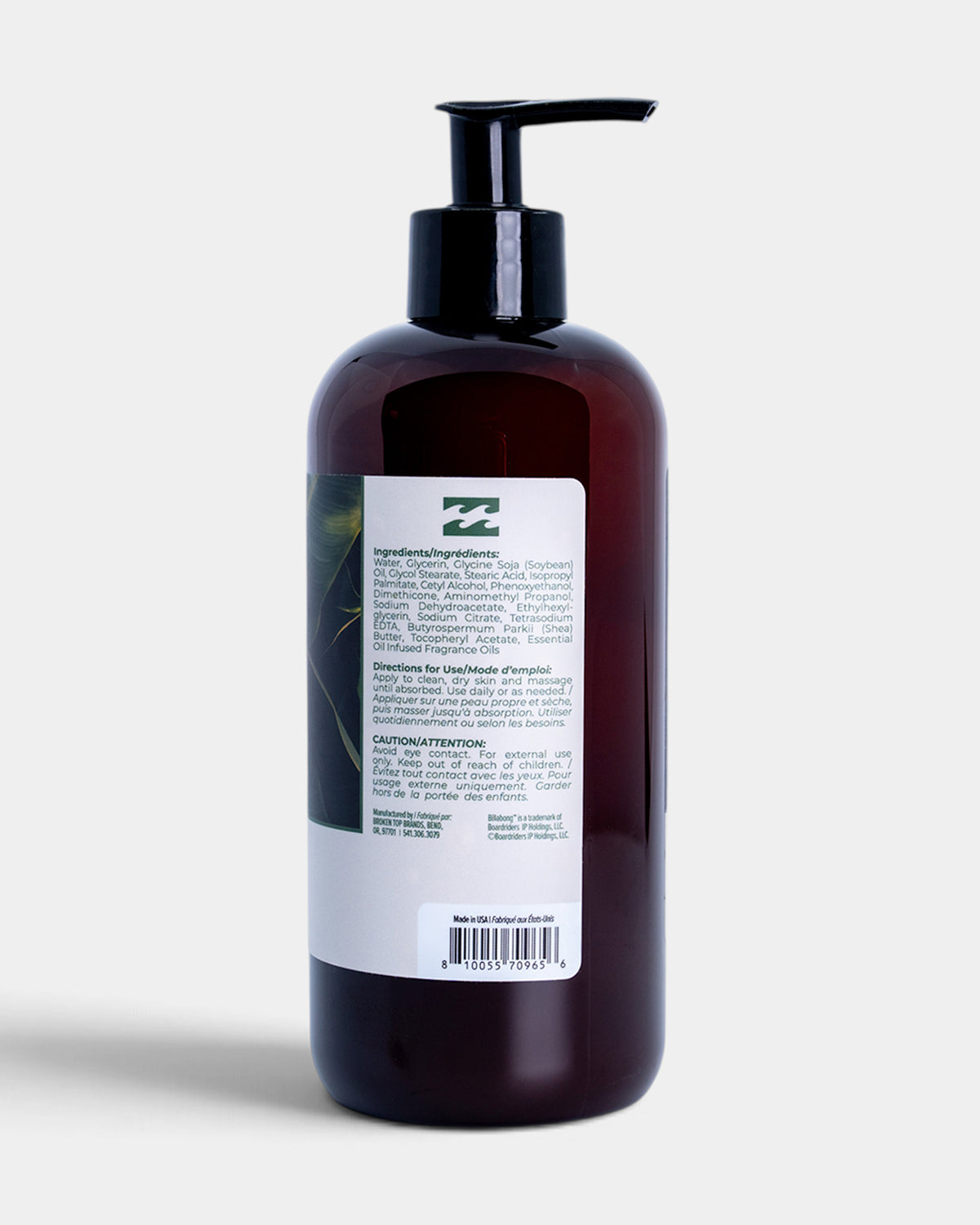 Dark glass bottle with black pump dispenser and white label showing ingredients and usage directions.