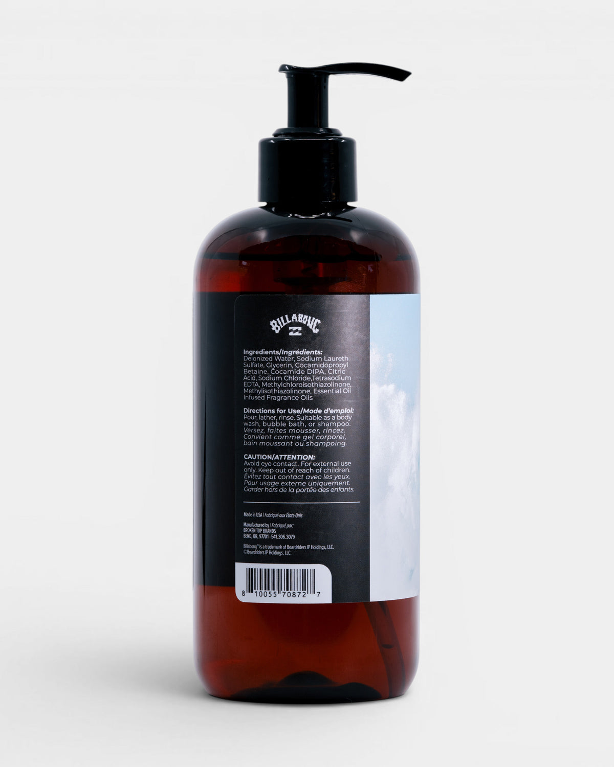 Dark amber glass pump bottle with black cap and label containing Break Water body wash product information.