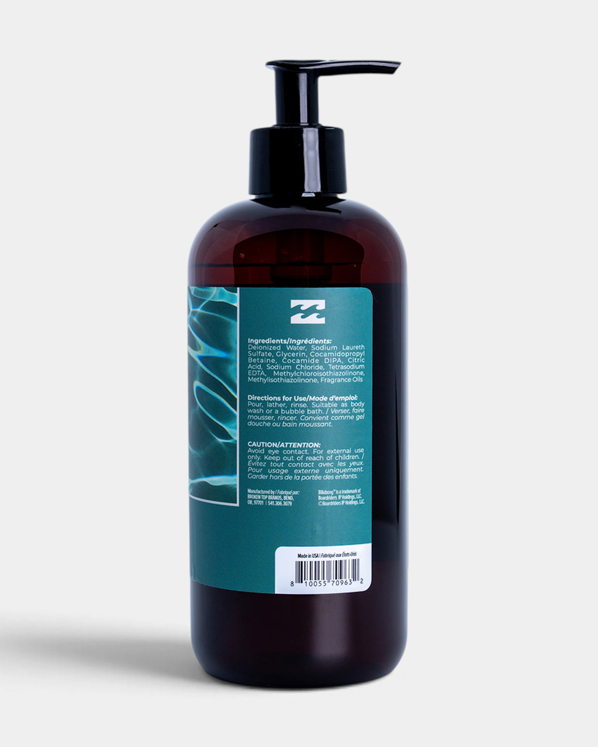 Dark amber bottle with black pump dispenser and teal label containing Blue Current Body Wash.