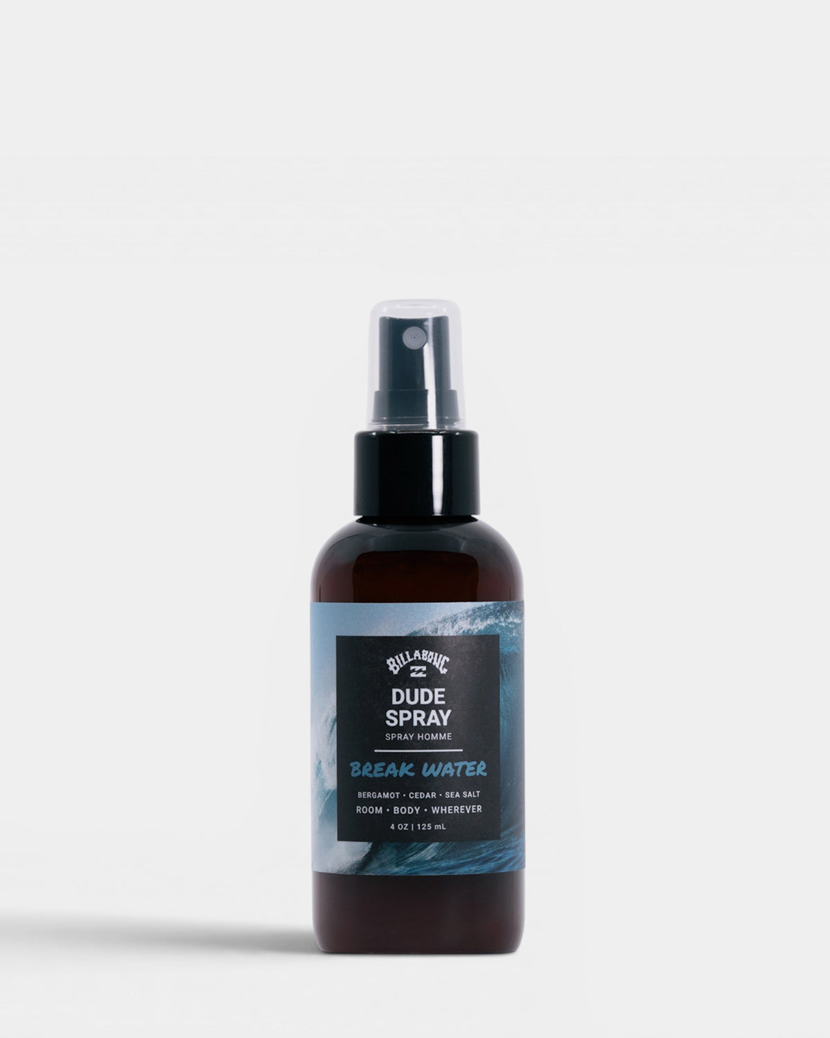 Dark amber spray bottle with black pump top and label featuring wave imagery and "Break Water" text.