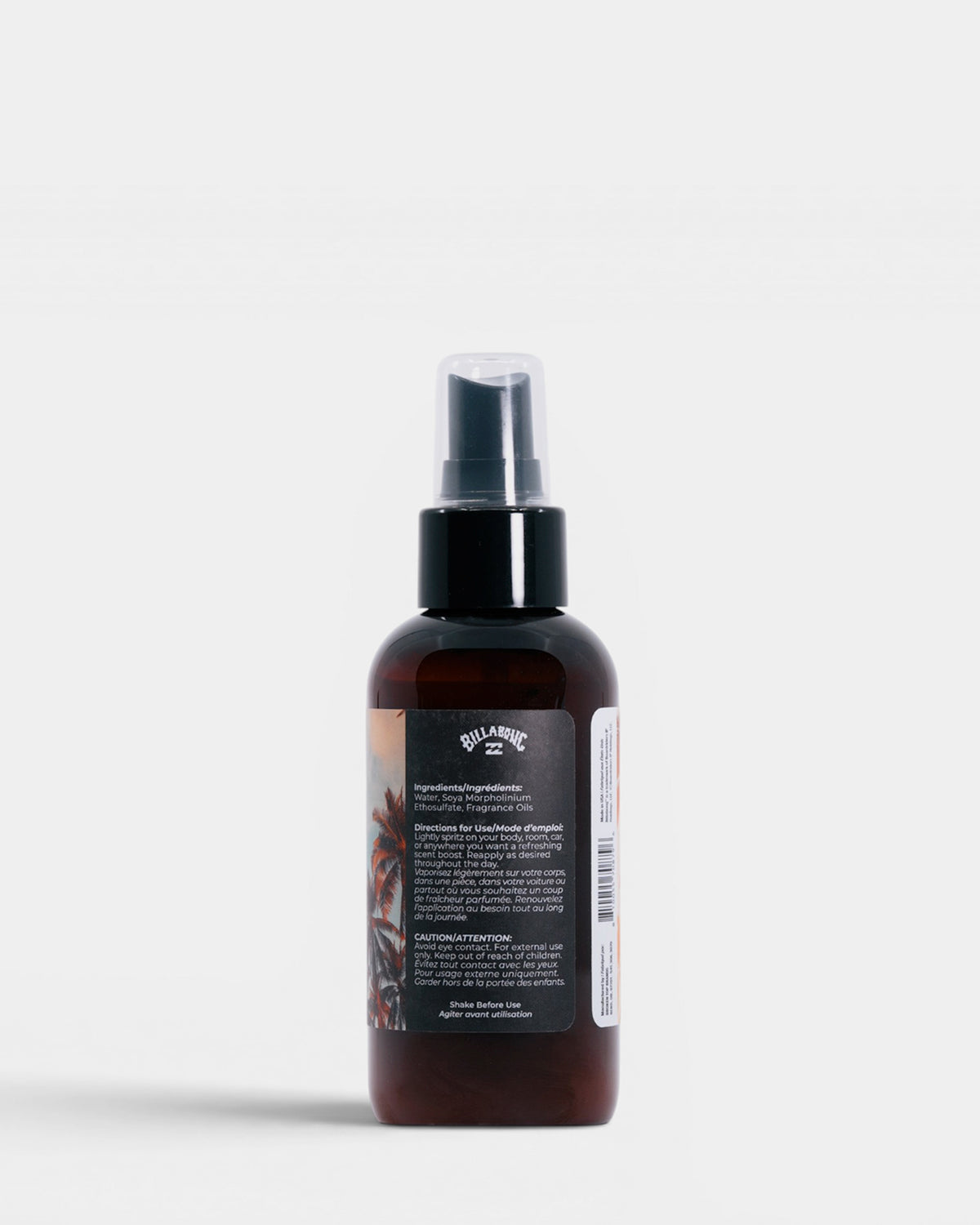Dark amber glass spray bottle with black pump top and printed label containing product information on white background.