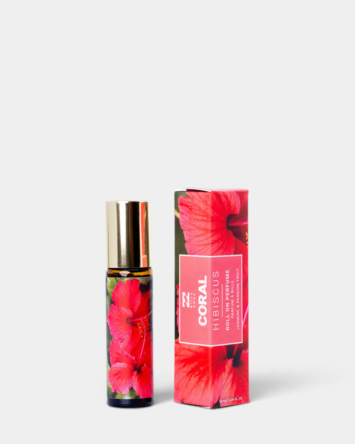 Coral Hibiscus roll-on perfume bottle with gold cap and matching floral-printed box packaging.