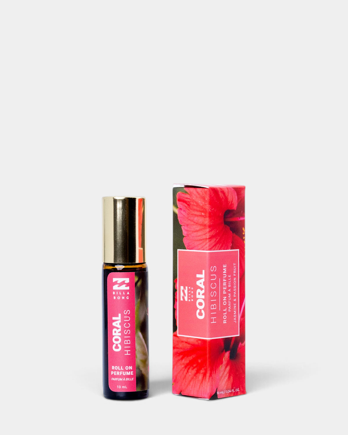 Dark bottle with pink label and gold-toned roll-on cap next to coral hibiscus patterned box.