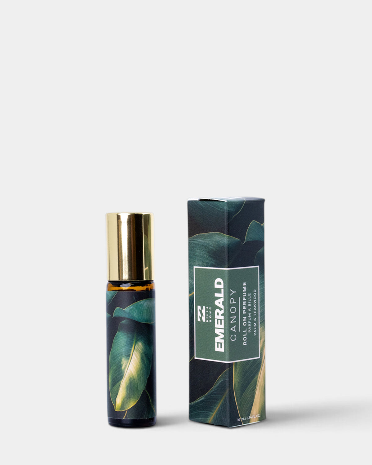 Roll-on perfume bottle with gold cap and dark glass featuring green leaf design, displayed with matching cylindrical box.