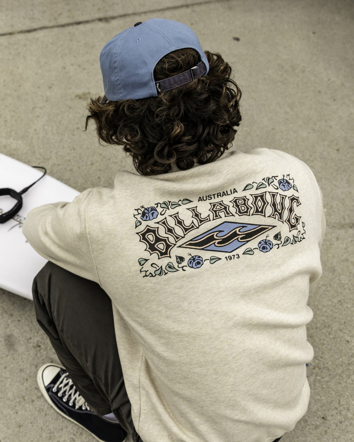 Oatmeal heather crewneck sweatshirt with Australia graphic and decorative pattern on back.